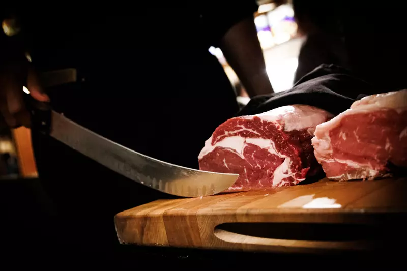 cutting steak tableside