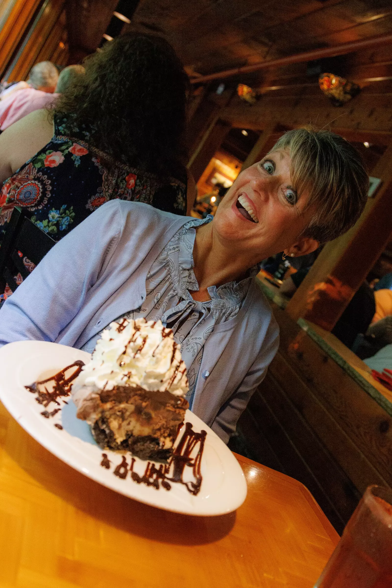 smiling woman with dessert