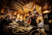 bartender at The Peddler pouring drink