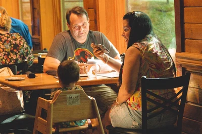 family with child at peddler